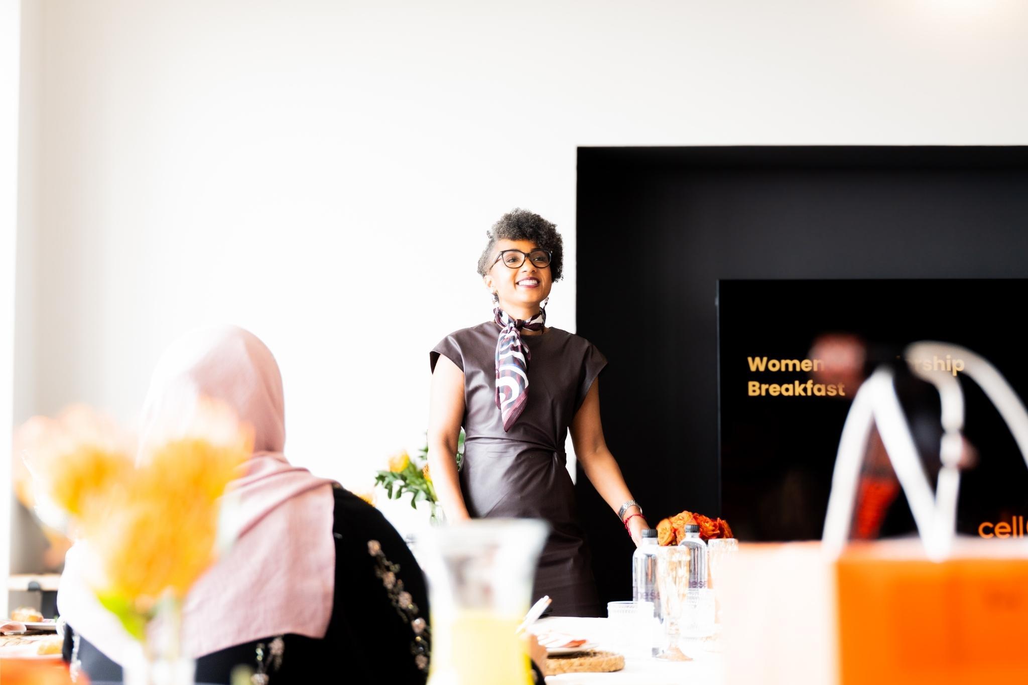 Speaker addressing guests at the Corevia Women in Leadership Business Breakfast